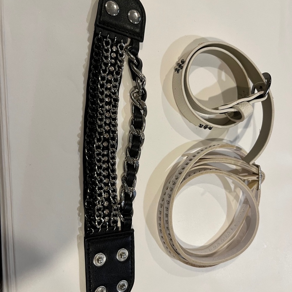 Set of 3 bracelets.  2 white and 1 black.